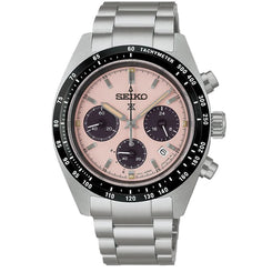 Seiko watch with a silver strap and pink face on a white background