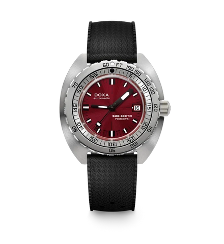 A Doxa Sub 300 TIT automatic watch with a deep red dial, silver stainless steel case, and a textured black rubber strap, shown against a plain white background.