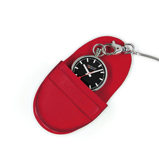A red leather watch pouch with a silver chain and clasp, holding a black dial pocket watch with a silver bezel, on a white background.