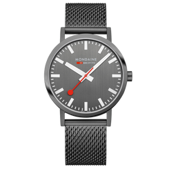 A Mondaine men's analog watch with a dark gray brushed dial, white hour markers and hands, a red second hand, and a dark gray mesh strap, shown against a plain white background.