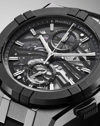 Maurice Lacroix watch with detailed mechanical components on a gray background