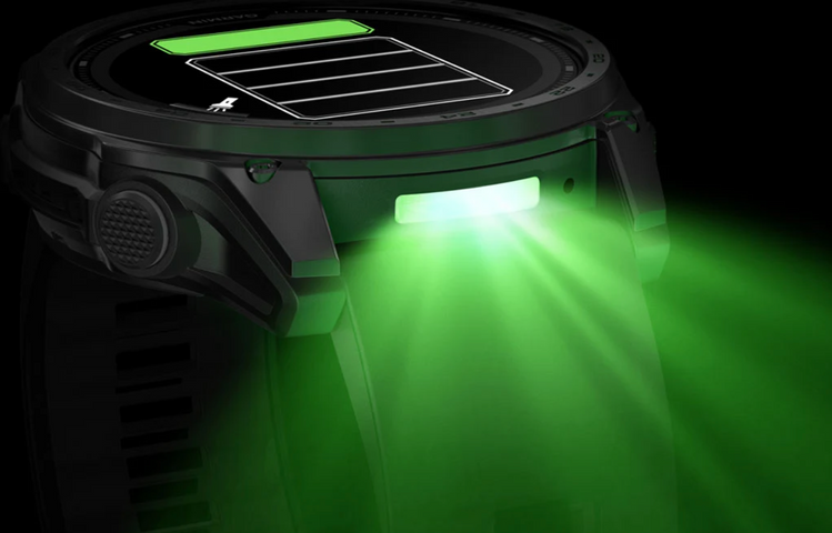 Green light-emitting device with solar panel on a dark background