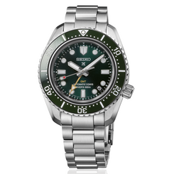 Seiko watch with green dial and silver metal bracelet on a white background