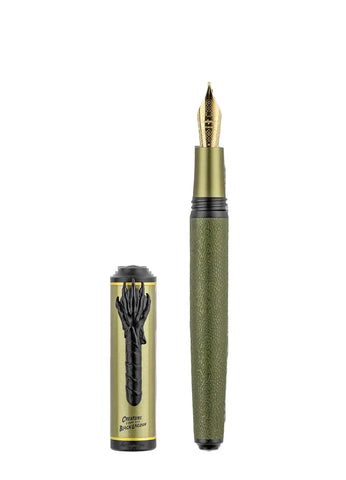 Fountain pen with green and gold design on a white background