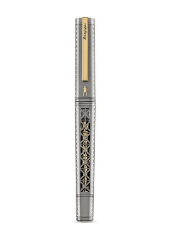 A luxury fountain pen shown vertically against a solid white background. The pen features a silver-toned metal body with intricate cutout patterns and a gold-toned clip, trim, and barrel top.