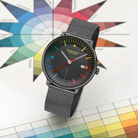Mondaine watch with colorful face on a color swatch background