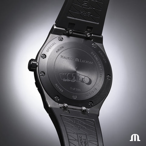 Back view of a Maurice Lacroix watch with branding and model details on a gray background