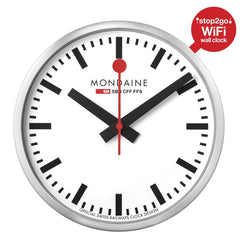 A round wall clock with a silver-toned metal frame, white dial, black hour markers and hands, and a red second hand. The brand name MONDAINE is printed on the dial.