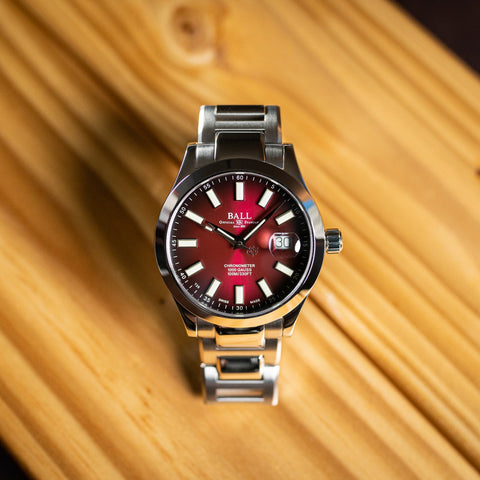 Ball Watch Company Engineer III Marvelight Chronometer Watch with red dial, steel bracelet, steel case