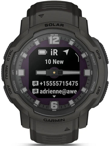 Garmin smartwatch with solar charging feature on a white background