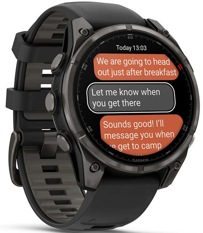 Smartwatch displaying a conversation on its screen with a black strap.