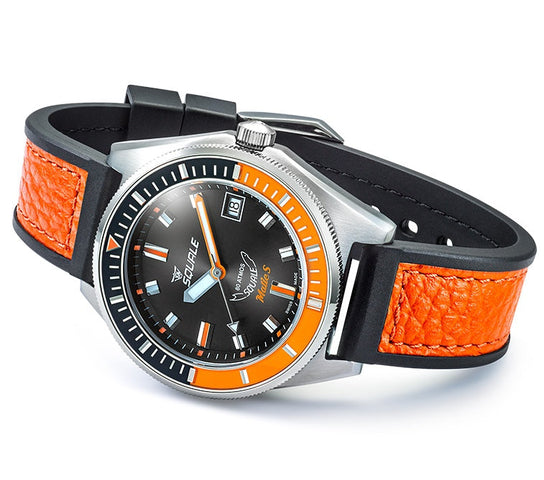 Watch with orange and black strap on a white background