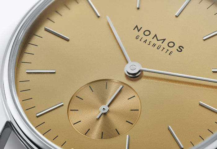 Nomos Glashutte Orion 33 Gold Sapphire Glass Watch