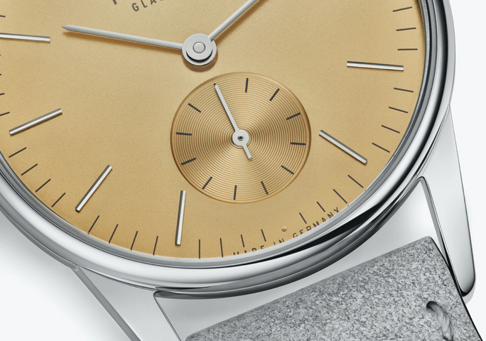 Nomos Glashutte Orion 33 Gold Sapphire Glass Watch