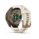 Fenix 9 Pro smartwatch with a beige silicone strap and a bronze-toned metallic case, shown from the back on a white background.