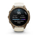 A Garmin smartwatch with a round bronze-toned metal case and a light cream-colored silicone strap, shown on a clean white background. The watch screen is active, displaying sleep and heart rate metrics.