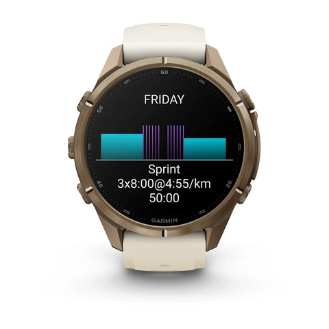 A Garmin smartwatch with a round bronze-toned case and a light beige strap, shown on a clean white background. The watch face displays a fitness screen with a sprint activity graphic.
