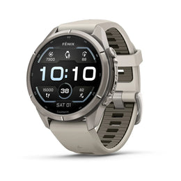 A Fenix smartwatch by Garmin, featuring a round silver stainless steel case and a light gray silicone strap, shown on a clean white background with a soft shadow.