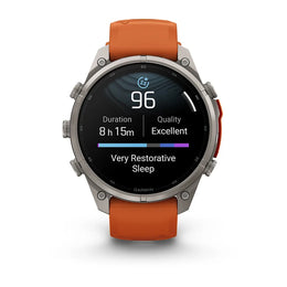 A Garmin smartwatch with a silver-toned metal case and an orange strap, shown on a clean white background. The watch face displays a sleep tracking screen with 'Very Restorative Sleep' and a sleep score of 96.