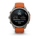 A Garmin smartwatch with a silver-toned metal case and an orange strap, shown on a clean white background. The watch face displays a sleep tracking screen with 'Very Restorative Sleep' and a sleep score of 96.