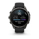 A Garmin smartwatch with a black strap and dark metallic case, shown from the front on a clean white background. The watch face displays sleep and activity metrics.