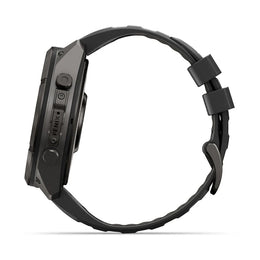 A black rugged smartwatch shown from the side profile against a clean white background, featuring a textured black strap and a dark metallic case with visible buttons and the FENIX brand name.