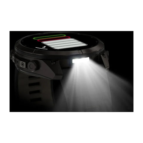 A rugged black smartwatch with a bright built-in LED light turned on, casting a strong beam of white light against a dark background.