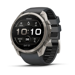 A Fenix smartwatch with a round silver titanium case and a dark gray silicone strap, shown at a three-quarter angle on a white background.