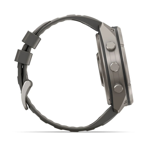 A side profile view of a rugged smartwatch with a dark gray textured strap and a metallic gray case, set against a plain white background.