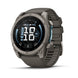 A Garmin Fenix smartwatch with a dark gray metallic case and a matching dark gray textured strap, shown at a three-quarter angle on a white background.