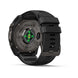 A rugged black smartwatch shown from the back, featuring a metallic dark gray case with 'FENIX 9' branding and a green heart icon on the backplate, alongside a black silicone strap. The NINJA band is visible on the upper right.