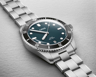 Oris Divers Date Watch with blue dial, steel bracelet, steel case