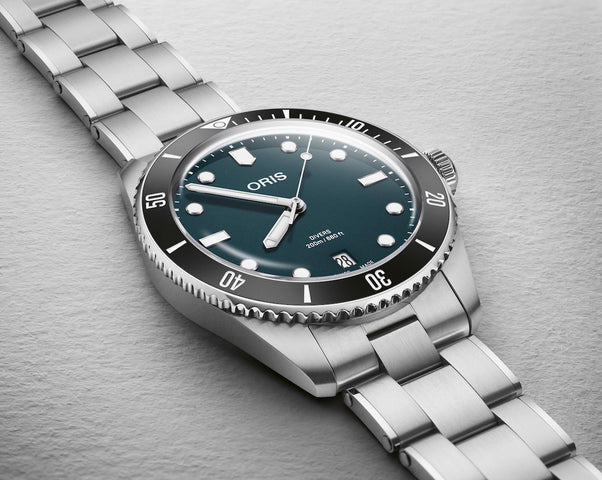Oris Divers Date Watch with blue dial, steel bracelet, steel case