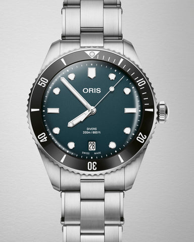 Oris Divers Date Watch with blue dial, steel bracelet, steel case