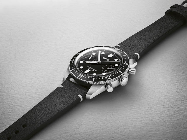 Oris Divers Sixty Five Chronograph Watch with black dial, leather strap, steel case
