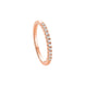 A rose gold eternity ring featuring a row of clear round-cut gemstones set in a polished band, shown on a clean white background with a soft shadow.