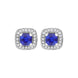 18ct white gold earrings featuring cushion-cut sapphires weighing 0.95 carats, complemented by diamonds totaling 0.19 carats in a claw and pave setting. The earrings exhibit a refined design that highlights the vibrant sapphires and sparkling diamonds.