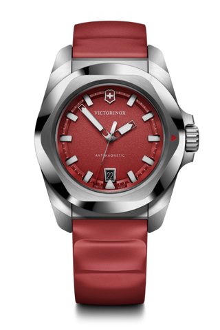 Victorinox watch with red strap and face on a white background