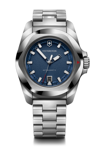 Silver Victorinox watch with blue dial on a white background