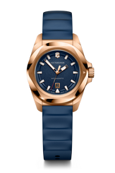 Victorinox watch with blue strap and rose gold casing on a white background