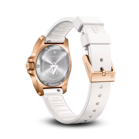 Victorinox watch with white strap and rose gold case on a white background