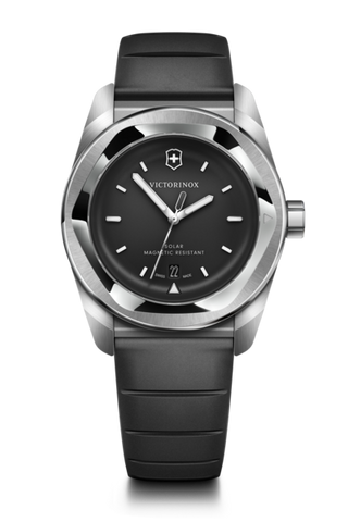 Victorinox watch with black strap and black dial on a black background