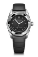 Victorinox watch with black strap and black dial on a black background