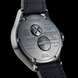Back view of a U-Boat watch with detailed specifications on a black background