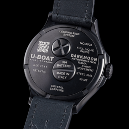 U-Boat watch case with detailed text on a black background
