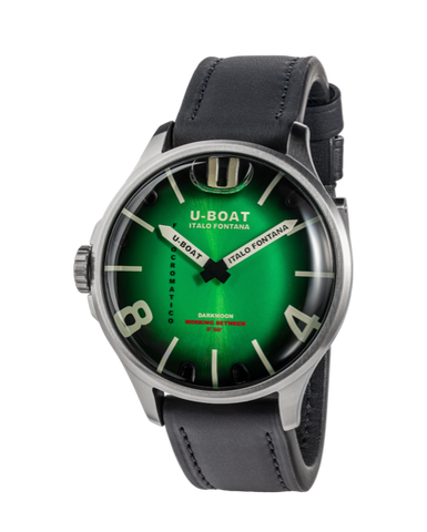U-Boat watch with green face and black leather strap on white background