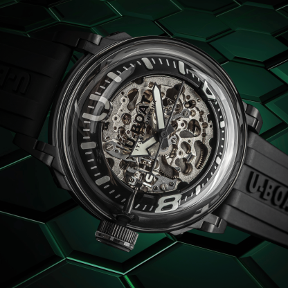 Black U-Boat watch with skeleton face on a green geometric background