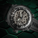 Black U-Boat watch with skeleton face on a green geometric background