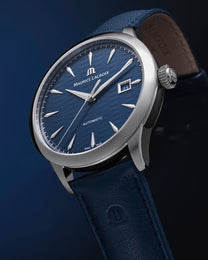 Maurice Lacroix watch with blue dial and leather strap on a dark background