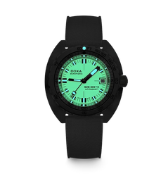 A black DOXA Submariner watch with a glowing green dial and black strap, shown against a plain white background.